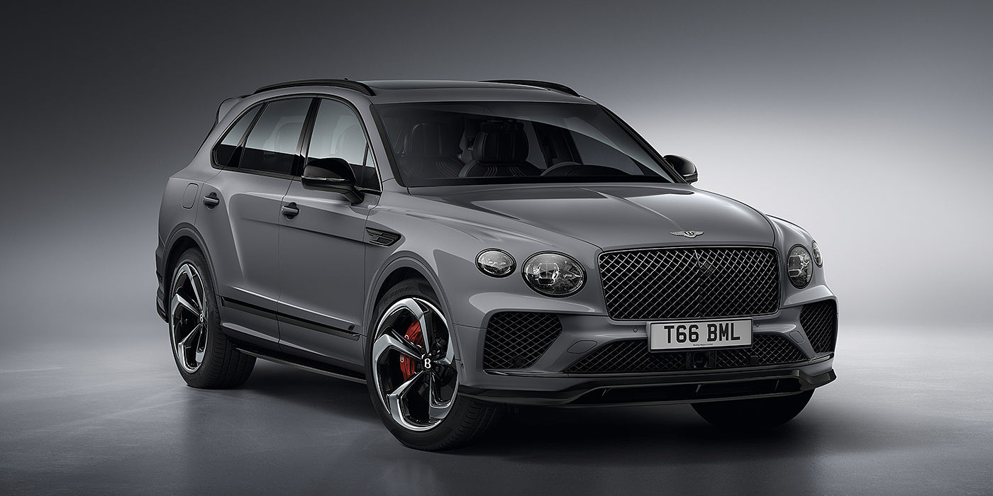 Bentley Shanghai - Pudong Bentley Bentayga S in Cambrian Grey paint front three - quarter view with dark chrome matrix grille and featuring elliptical LED matrix headlights. 